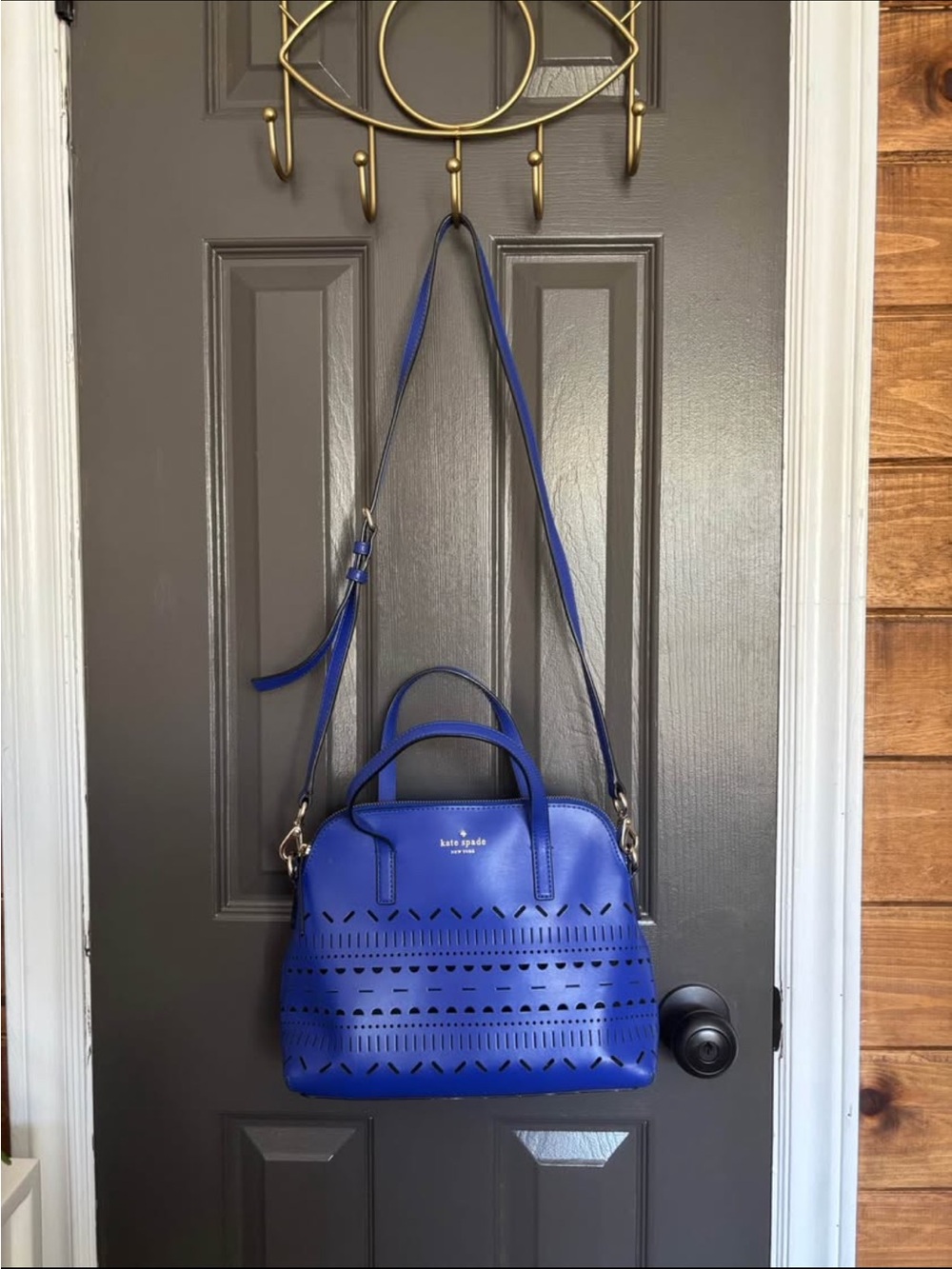 kate spade cobalt blue laser-cut satchel with crossbody strap